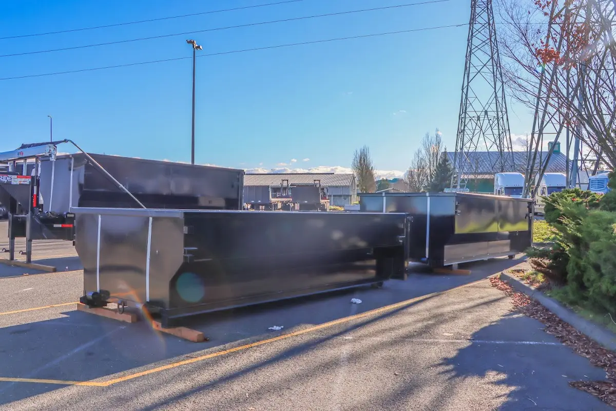 Roll-off dumpster ready for waste disposal at job site for Estate Cleanout Dumpster Rental in Oak Bluffs